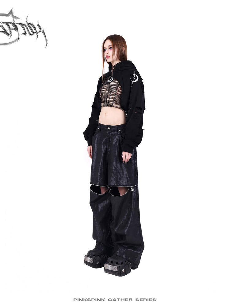 PINKSPINK GEOMETRY open-mesh crop tee in black — angled full-length styling view under a cropped layer