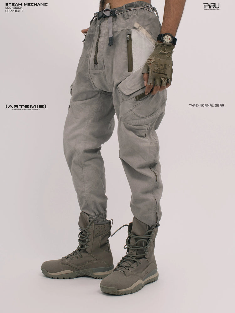 AEGIS lunar sea gray multi-pocket moto pants — three-quarter modeled view facing left