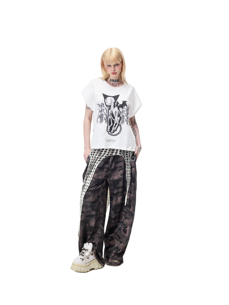 PINKSPINK DEVILCAT leopard-back graphic tee in white — full-length front view styled with separate camouflage pants