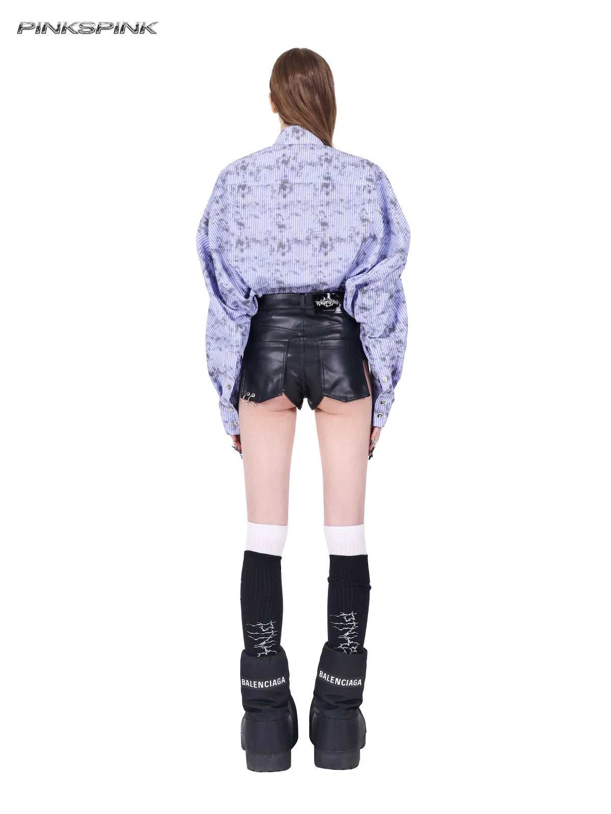 PINKSPINK REBEL ring-pierced faux-leather hotpants in black — full back view showing rear patch pockets and a branded waistband patch