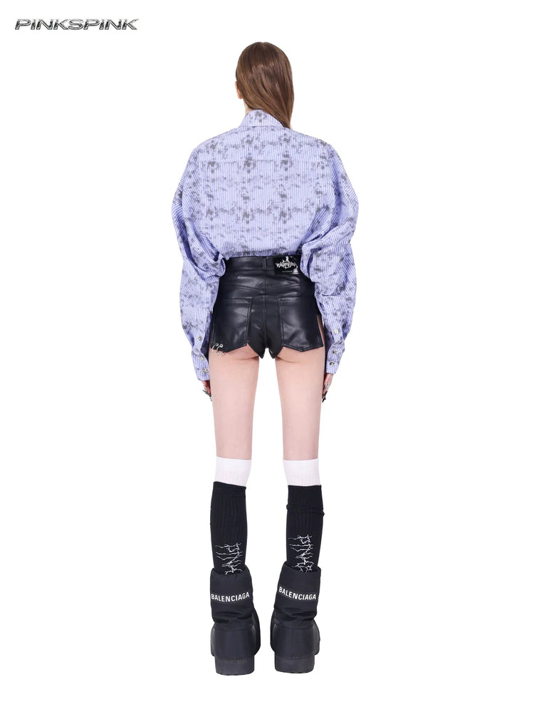 PINKSPINK REBEL ring-pierced faux-leather hotpants in black — full back view showing rear patch pockets and a branded waistband patch
