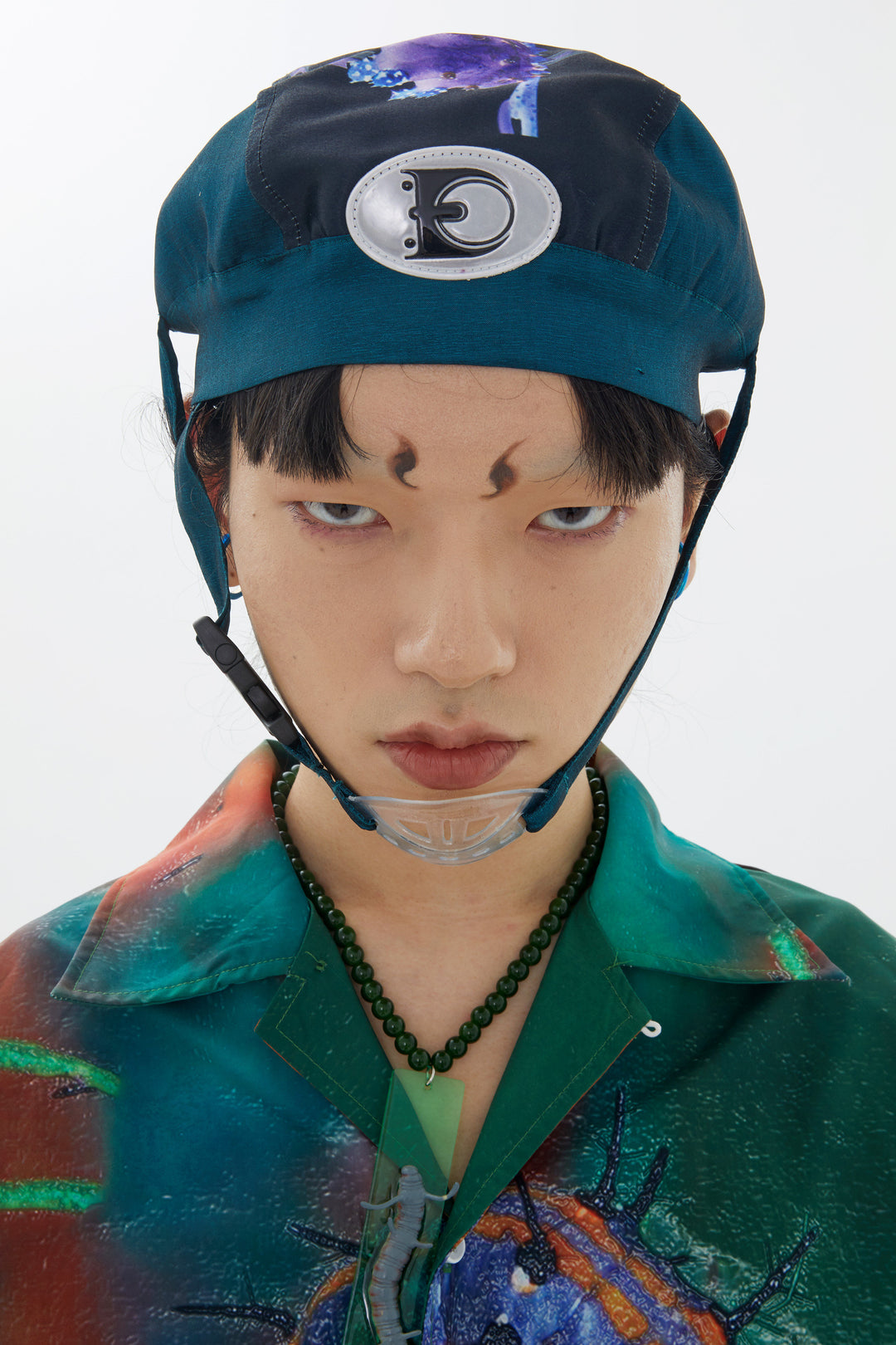 EMBRYO LARVA patchwork cycling cap — material and hardware detail