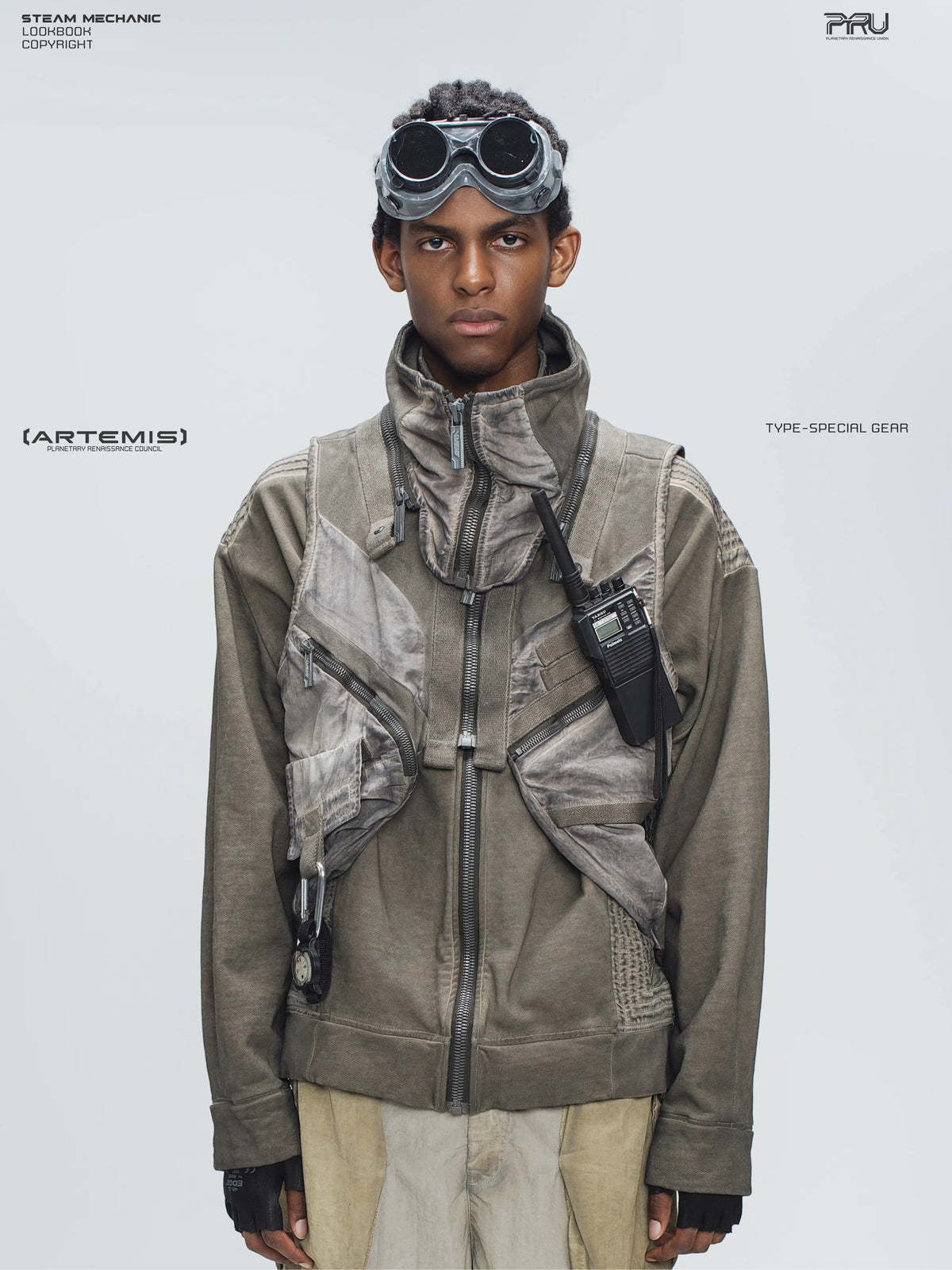 FISSION modular vest in mercury brown — close modeled front view showing the detachable collar and diagonal pockets