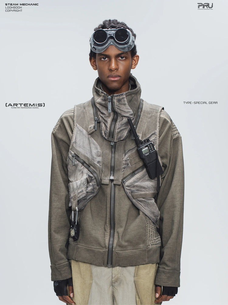 FISSION modular vest in mercury brown — close modeled front view showing the detachable collar and diagonal pockets
