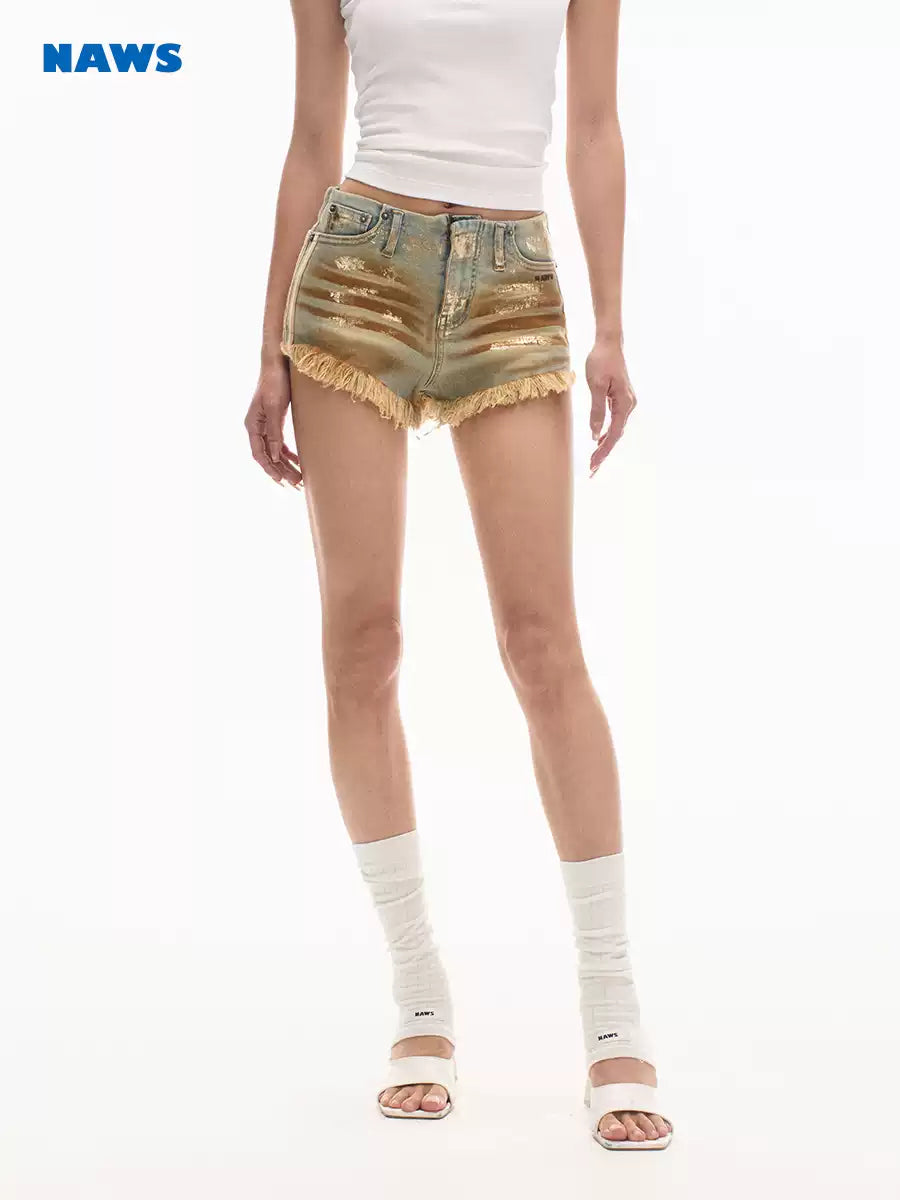 NAWS PYTHON distressed denim shorts — alternate modeled view showing the silhouette