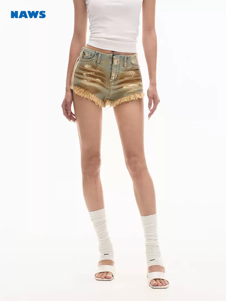 NAWS PYTHON distressed denim shorts — alternate modeled view showing the silhouette