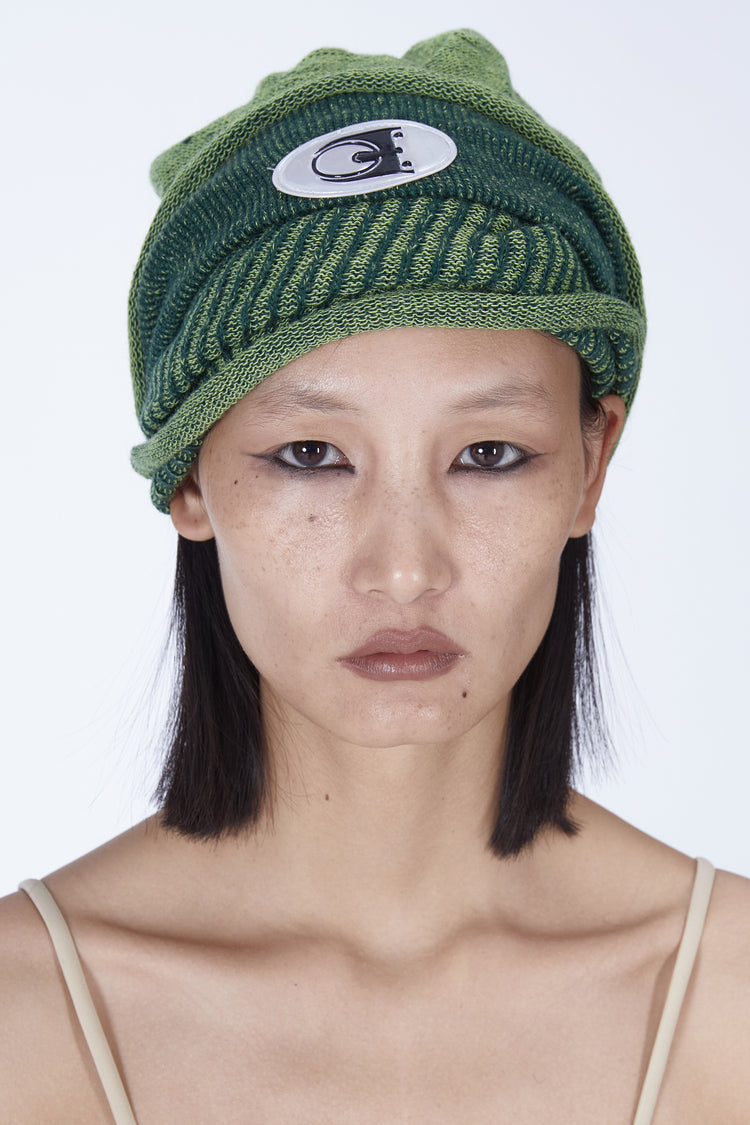 EMBRYO DOUBLE FORM convertible knit hat — rear modeled view