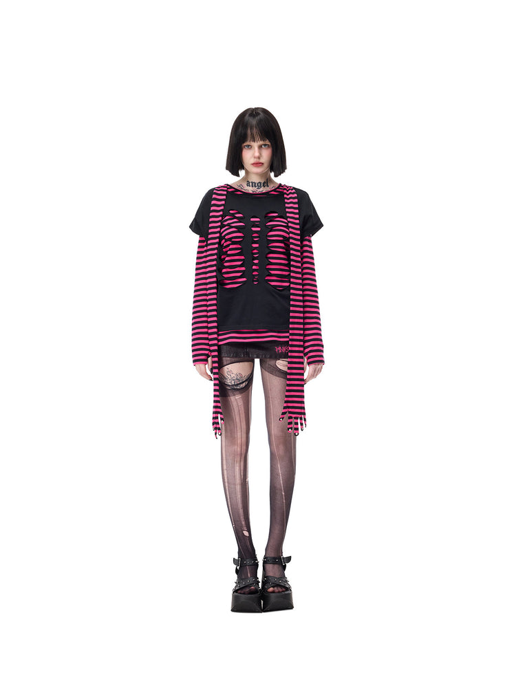 PINKSPINK CATACOMB reversible cat-skull tee in black — neutral cutout-face view over a separate pink striped tee, matching the gallery styling