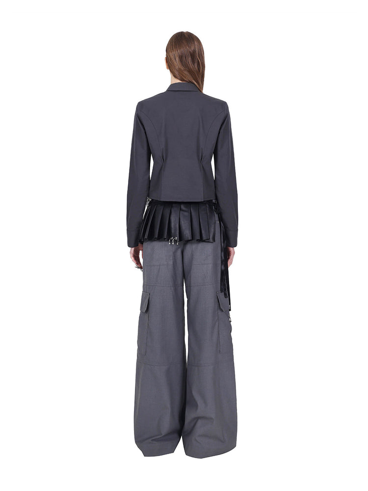 PINKSPINK ELECTRIC MOON sculpted cropped cotton shirt in gray — full-length rear modeled view with gray trousers