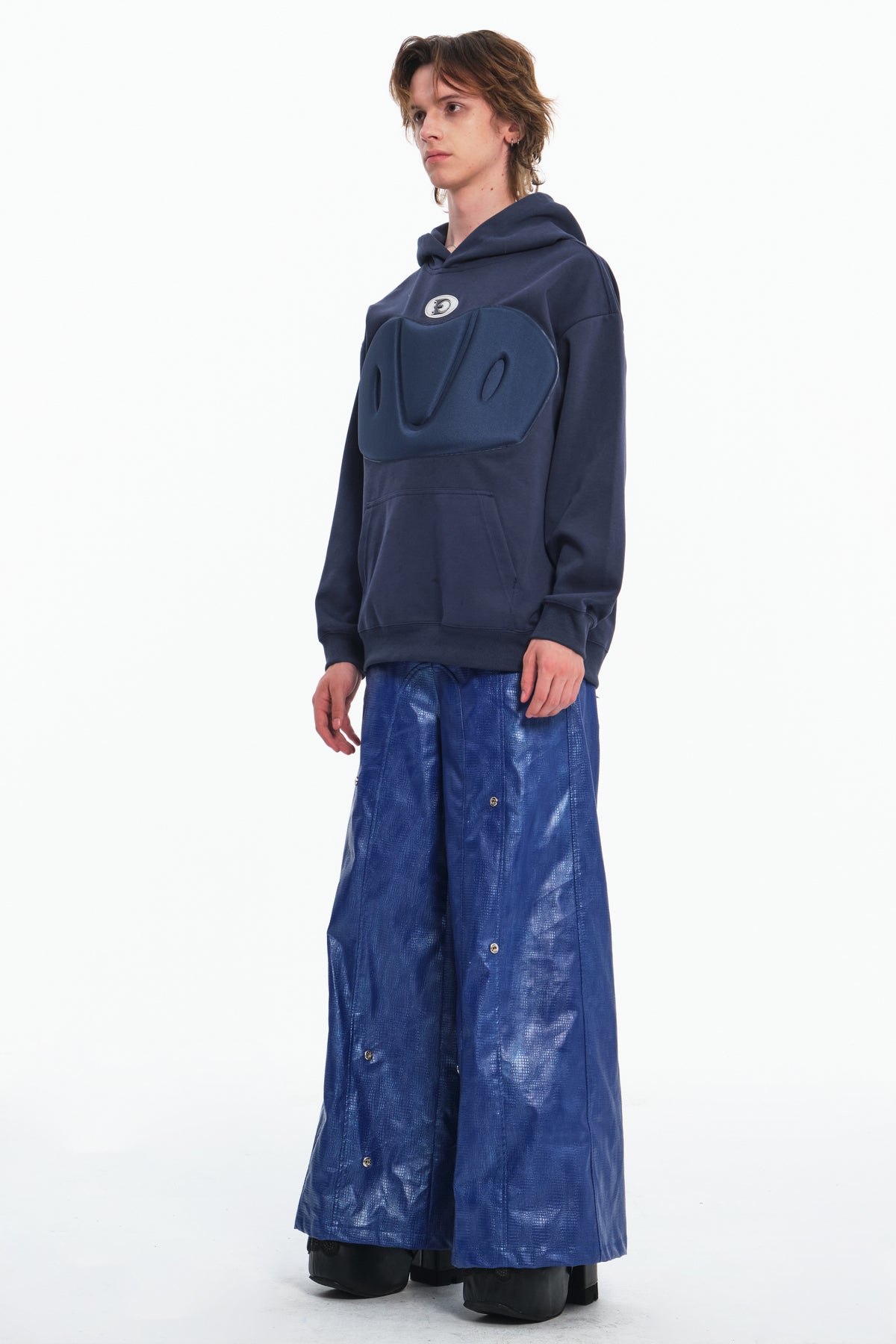 EMBRYO IMPACT SHIELD padded hoodie — material and hardware detail