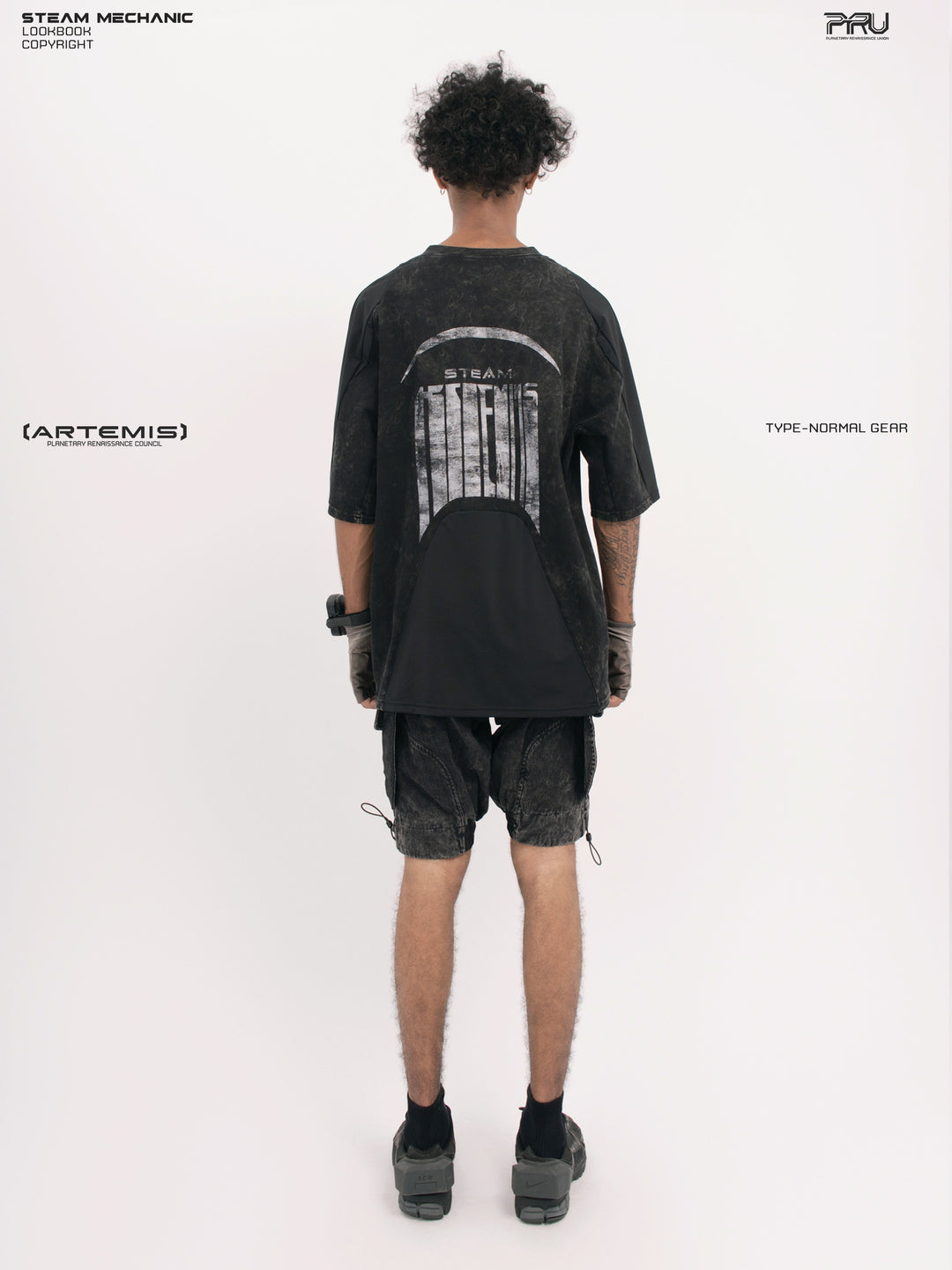 STARCORE black tortoise velcro mesh tee — straight rear modeled view with arms down