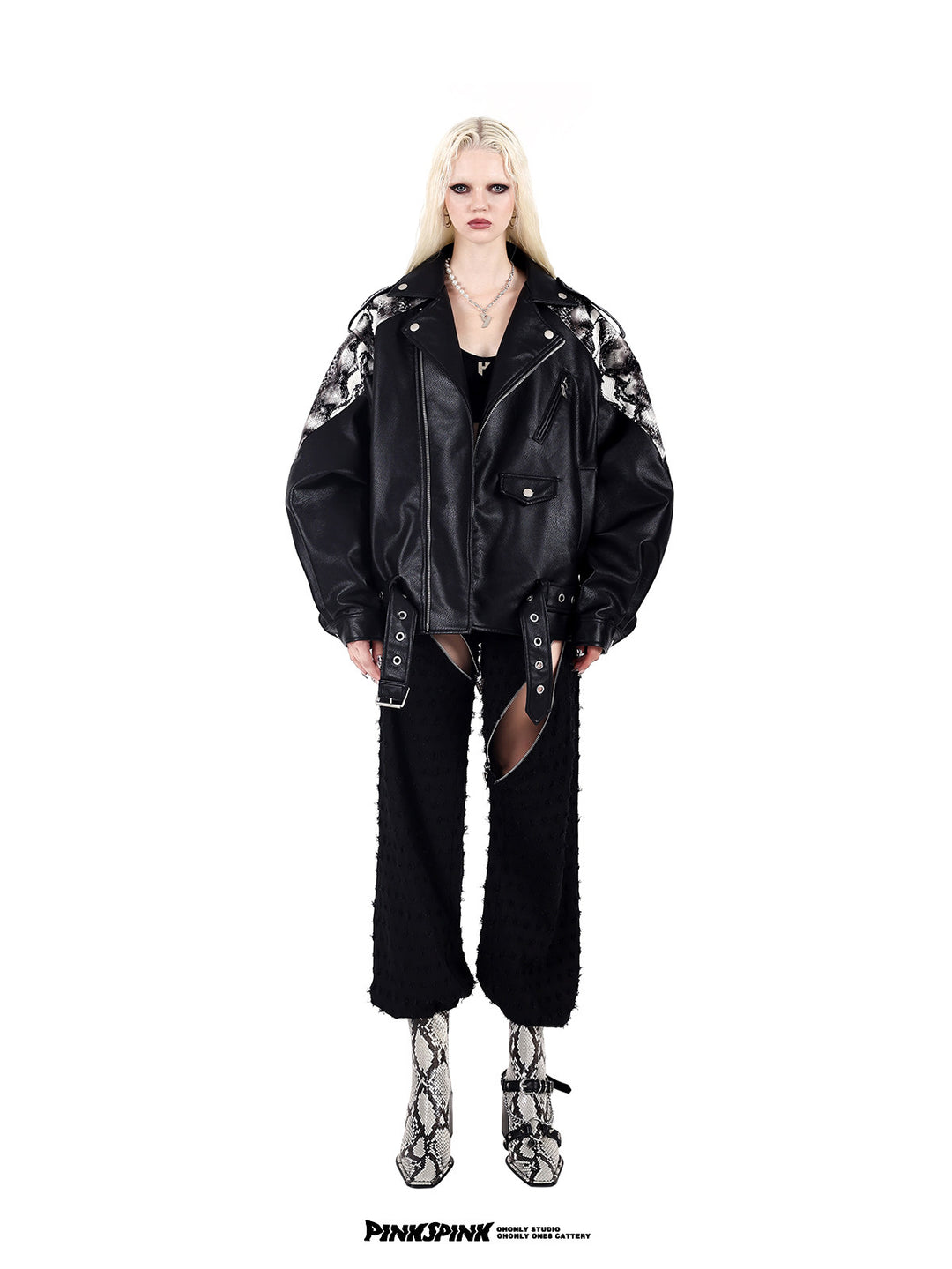 PINKSPINK COBRA snake-print faux-leather moto jacket — black full-length front modeled view styled with distressed cut-out trousers