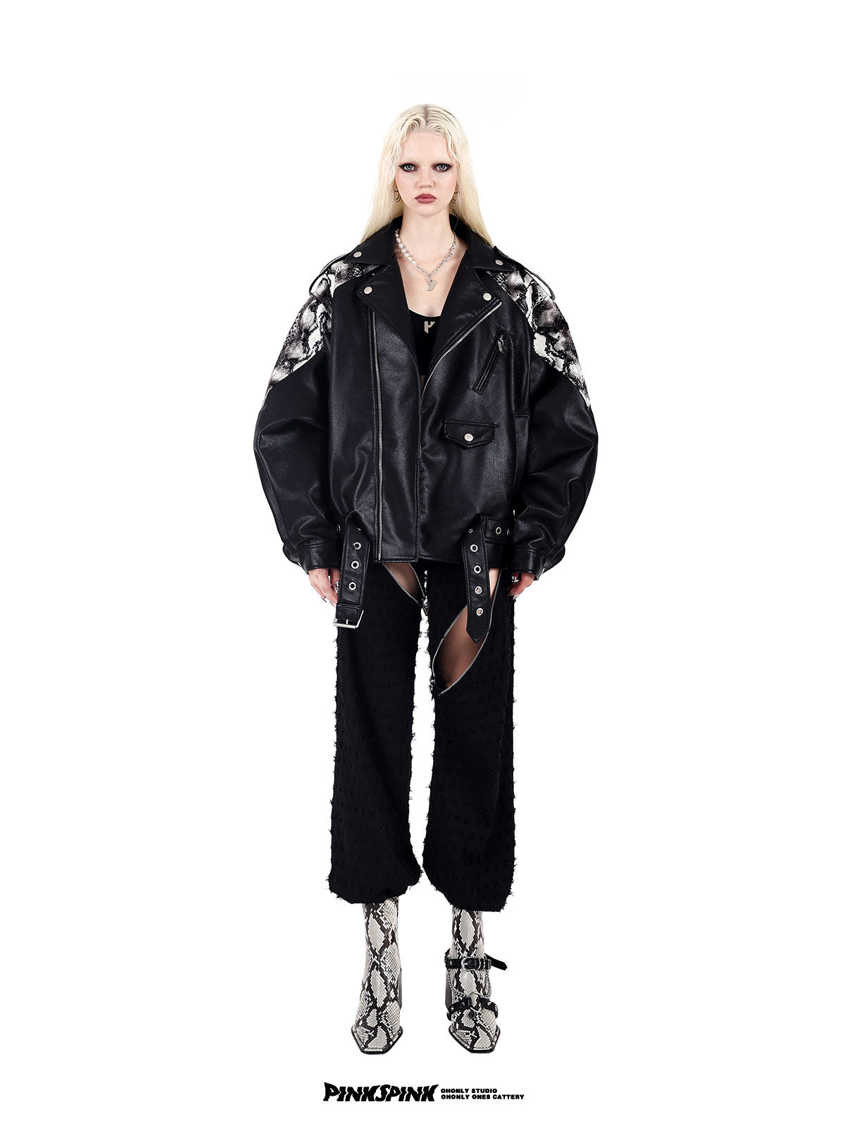 PINKSPINK COBRA snake-print faux-leather moto jacket — black full-length front modeled view styled with distressed cut-out trousers