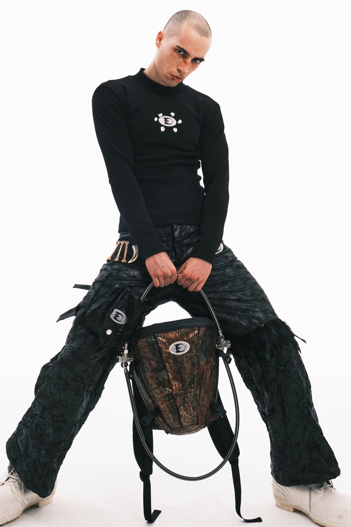 EMBRYO ORACLE embossed backpack — construction detail
