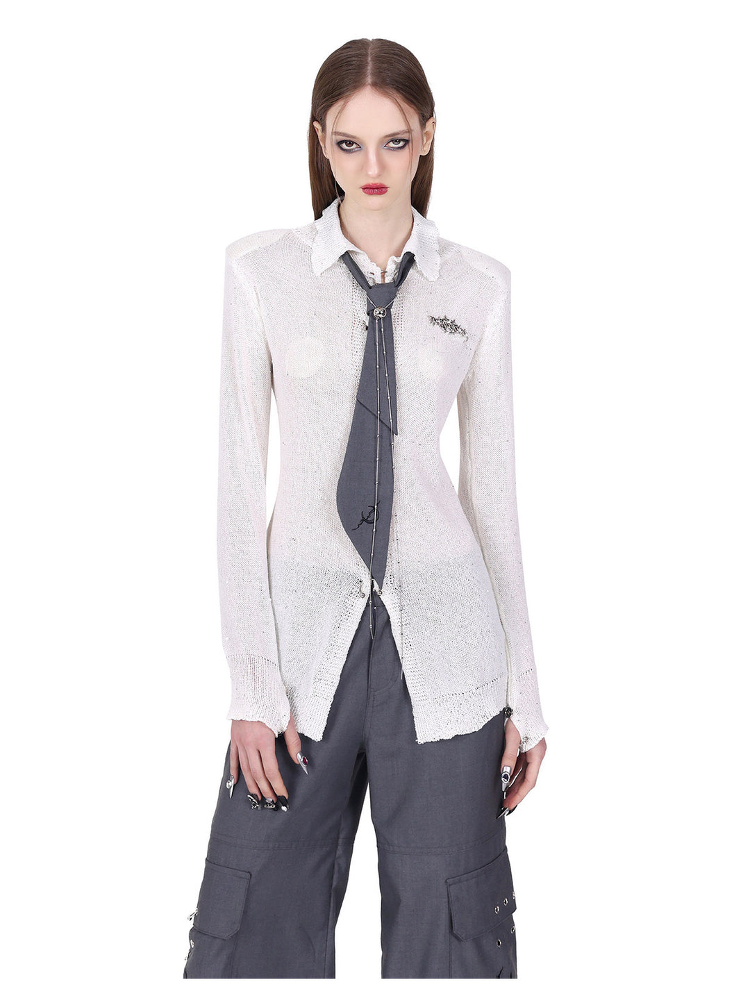 PINKSPINK ELECTRIC MOON ring-fastened sequin knit shirt in white — close front view of the sheer sequin knit and padded shoulders, styled with a gray tie