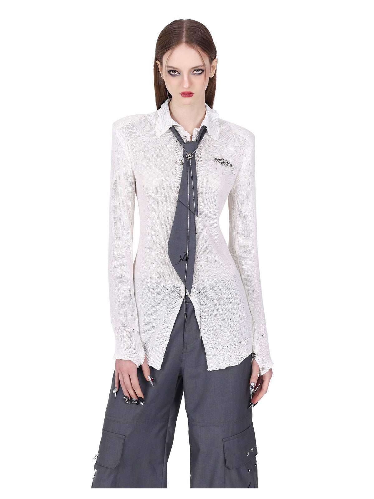 PINKSPINK ELECTRIC MOON ring-fastened sequin knit shirt in white — close front view of the sheer sequin knit and padded shoulders, styled with a gray tie