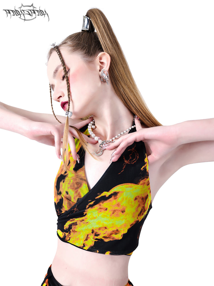 PINKSPINK FLAME halter crop top — black neckline and flame-print close-up