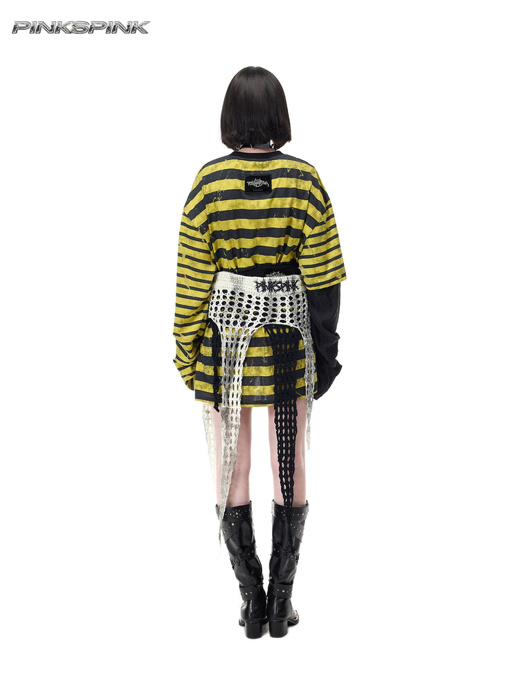 PINKSPINK THORNSTAR open-knit layering skirt in ivory white — full-length rear modeled view layered with a separate black skirt over a striped tee