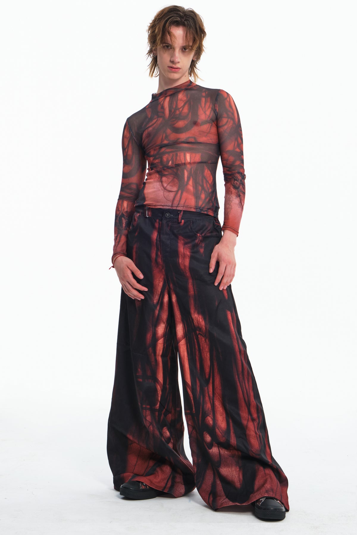 EMBRYO NERVE BLOOM printed flare pants — construction detail