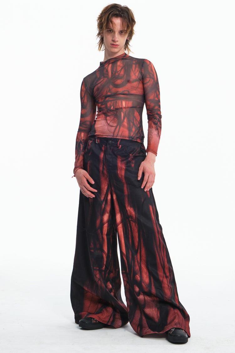 EMBRYO NERVE BLOOM printed flare pants — construction detail