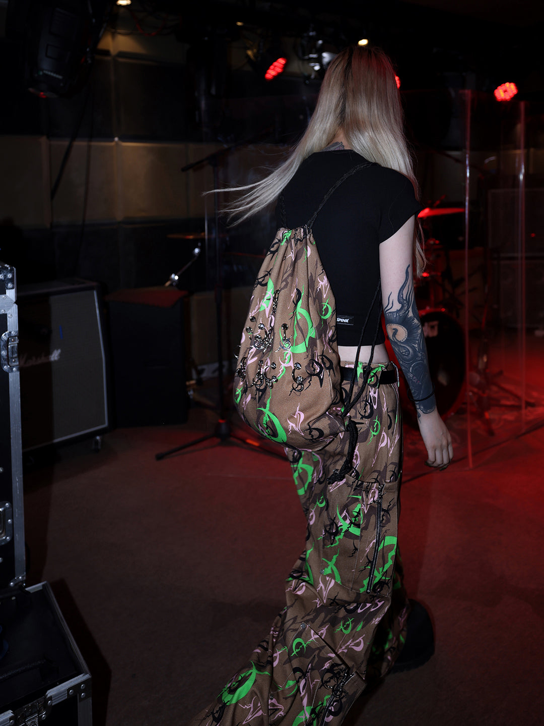 PINKSPINK ELECTRIC MOON sculpted camo cargo trousers in CAMOUFLAGE — rear three-quarter showing a zippered side pocket.