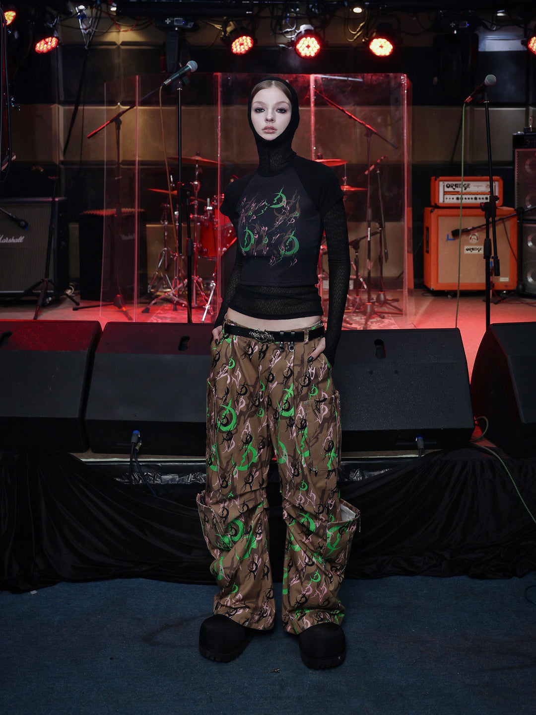 PINKSPINK ELECTRIC MOON fitted mesh crop tee — full-length front modeled view with camouflage trousers