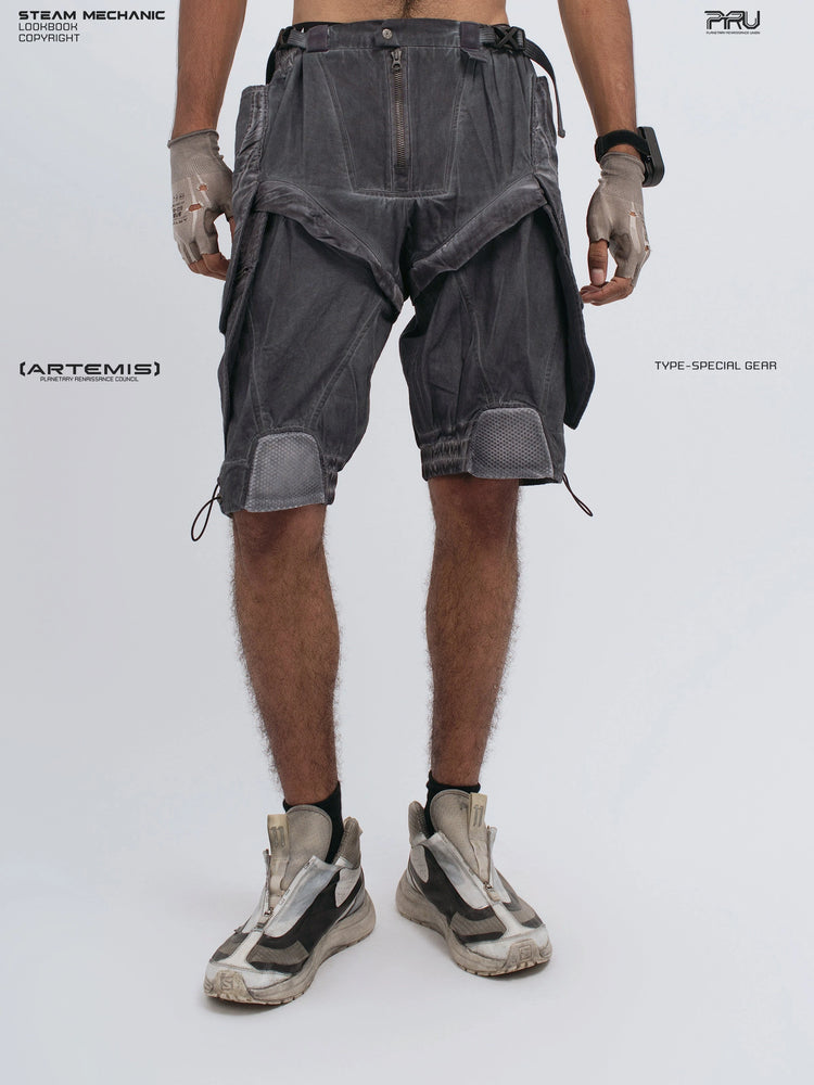 ARTEMIS stellar blue detachable technical shorts — front view with relaxed stance and open left hand
