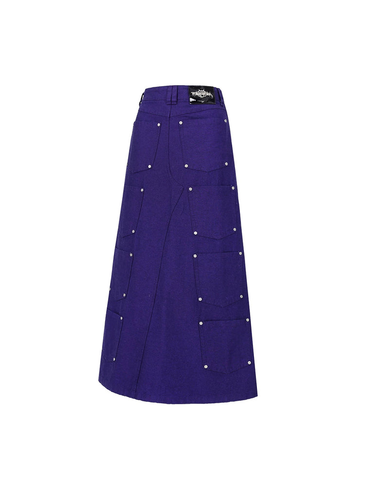 PINKSPINK DNA reconstructed multi-pocket denim maxi skirt — front garment-only view showing the reconstructed pocket layout