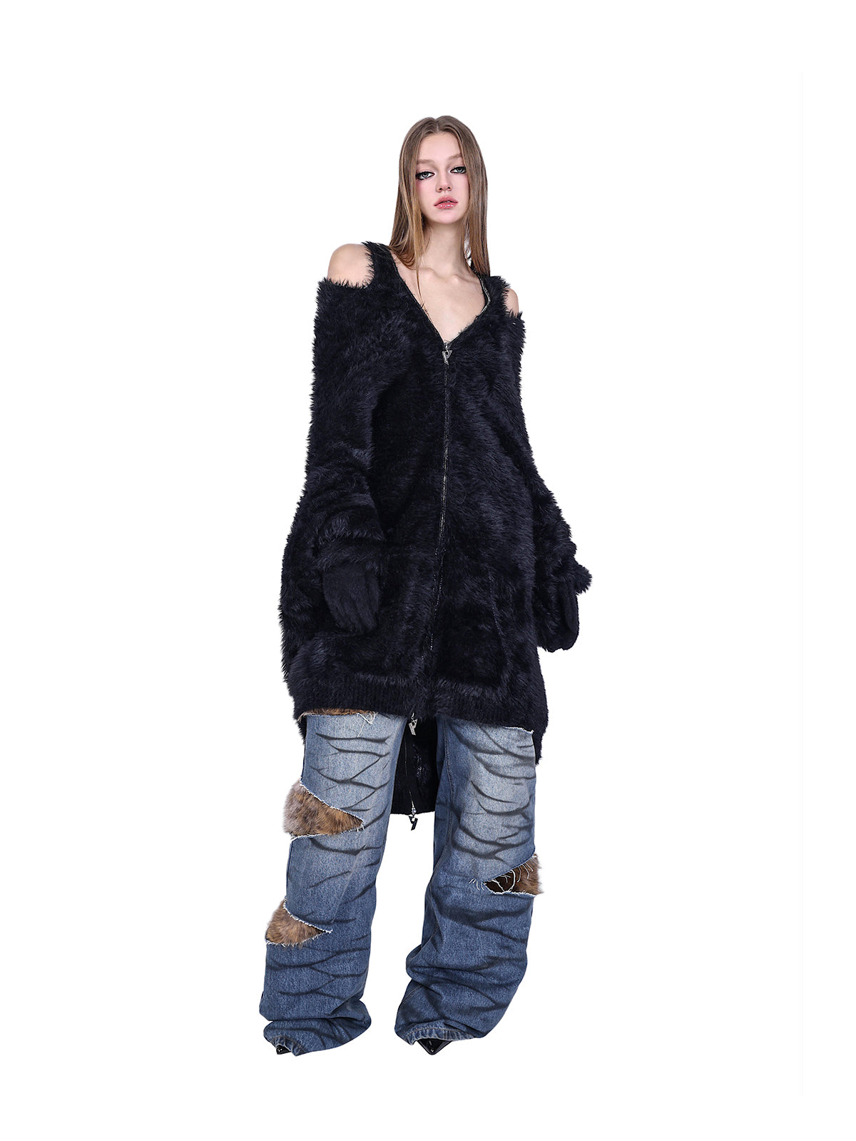 PINKSPINK SCRATCH leopard-panel layered jeans — modeled angled front view with a black jacket draped off the shoulders