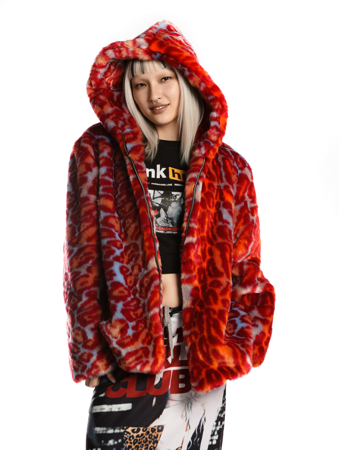 DeadEndKids leopard-print faux-fur hooded jacket in orange blue — modeled view with the hood up