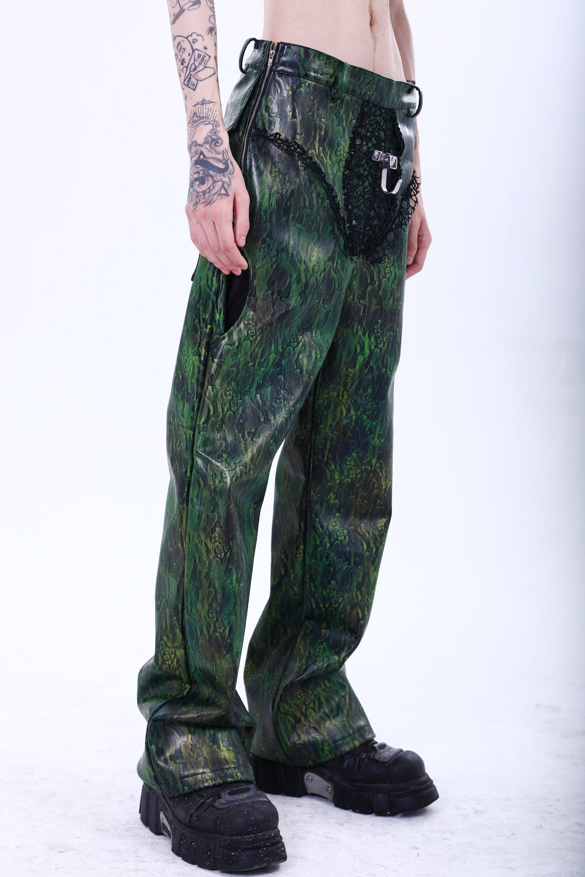 EMBRYO TRIANGLE ARMOR lace-inset leather pants — fabric and graphic detail