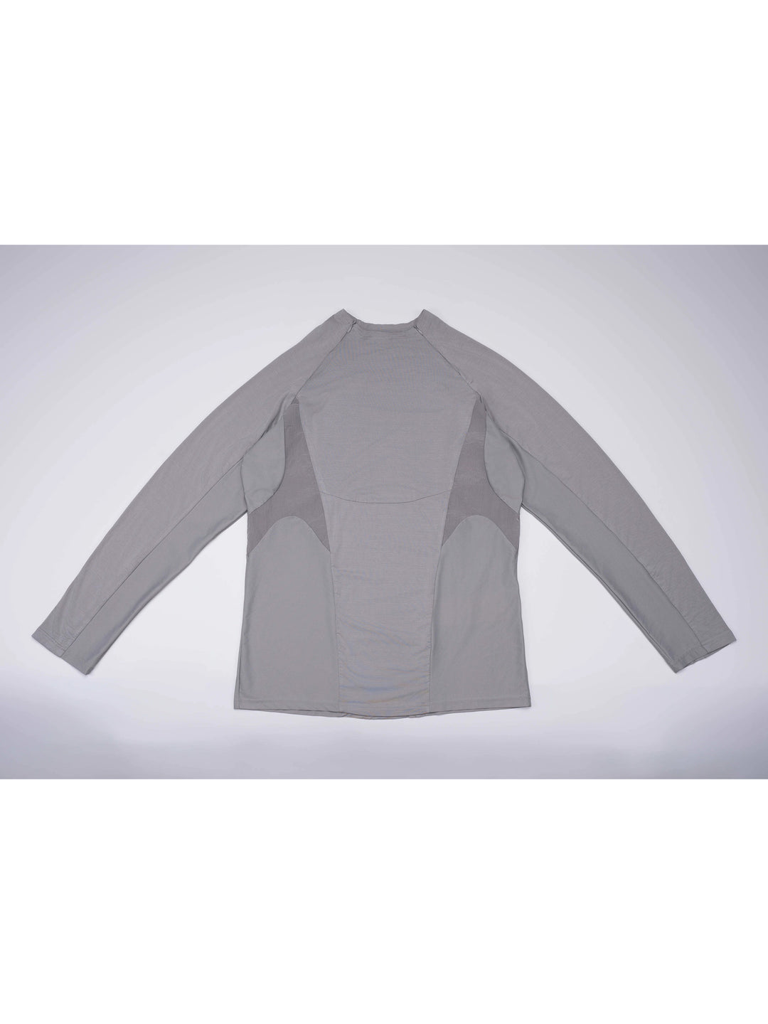 ARTEMIS moon dust gray stretch technical base-layer top — moon dust gray front flat lay showing curved contrast panels