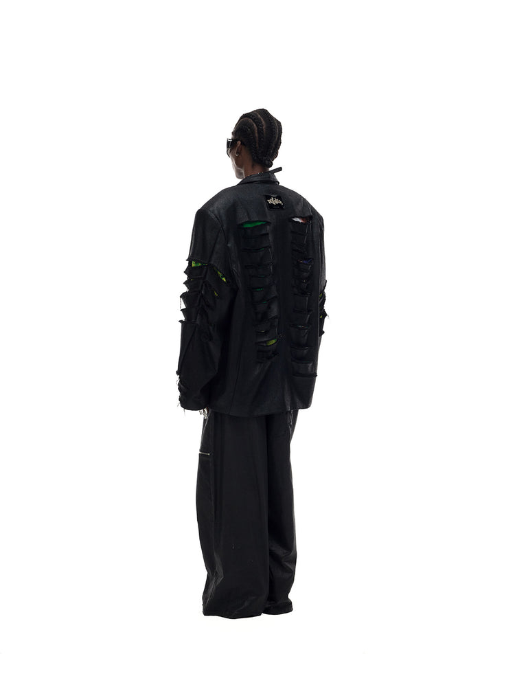PINKSPINK BREACH distressed coated oversized blazer in black — angled full-length rear modeled view showing the broad silhouette