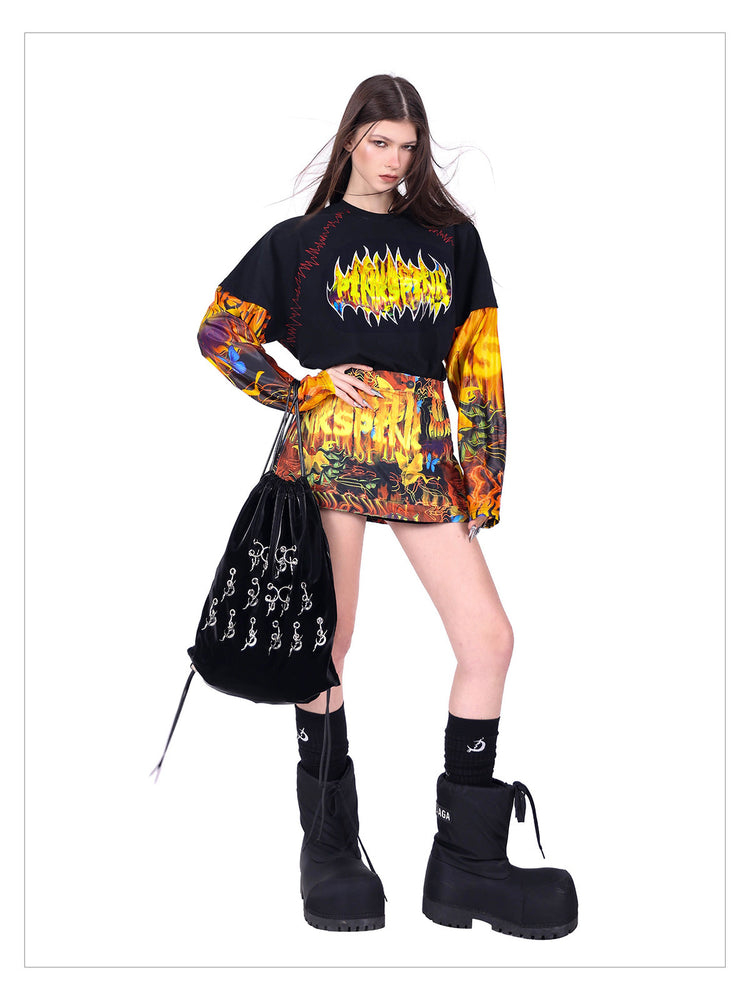 PINKSPINK FIRE CAT layered-sleeve graphic tee — product detail view showing texture and hardware