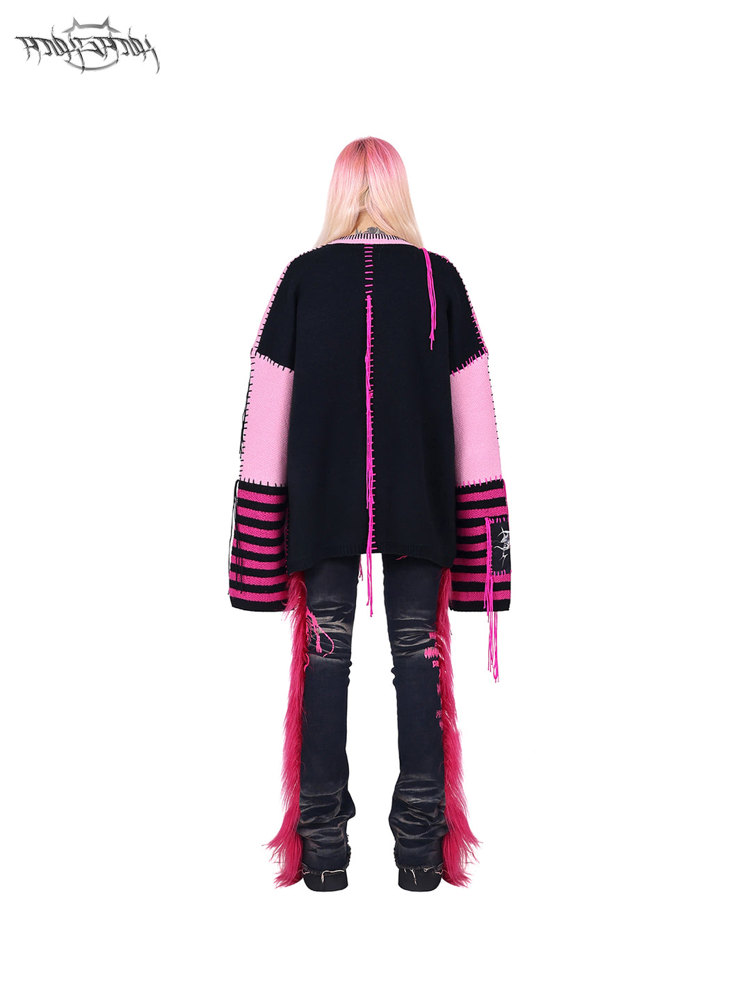 PINKSPINK BARBIE faux-fur flared jeans in PINK — rear full-body view with a pink-and-black sweater.