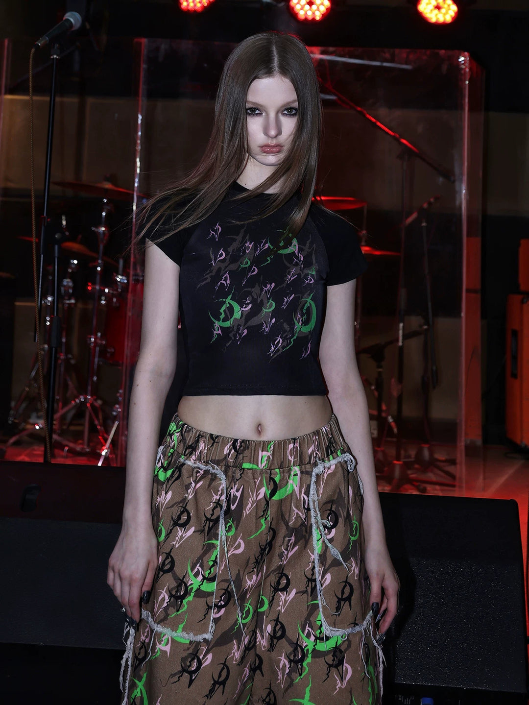 PINKSPINK ELECTRIC MOON fitted mesh crop tee — front modeled view of the black fitted graphic crop tee