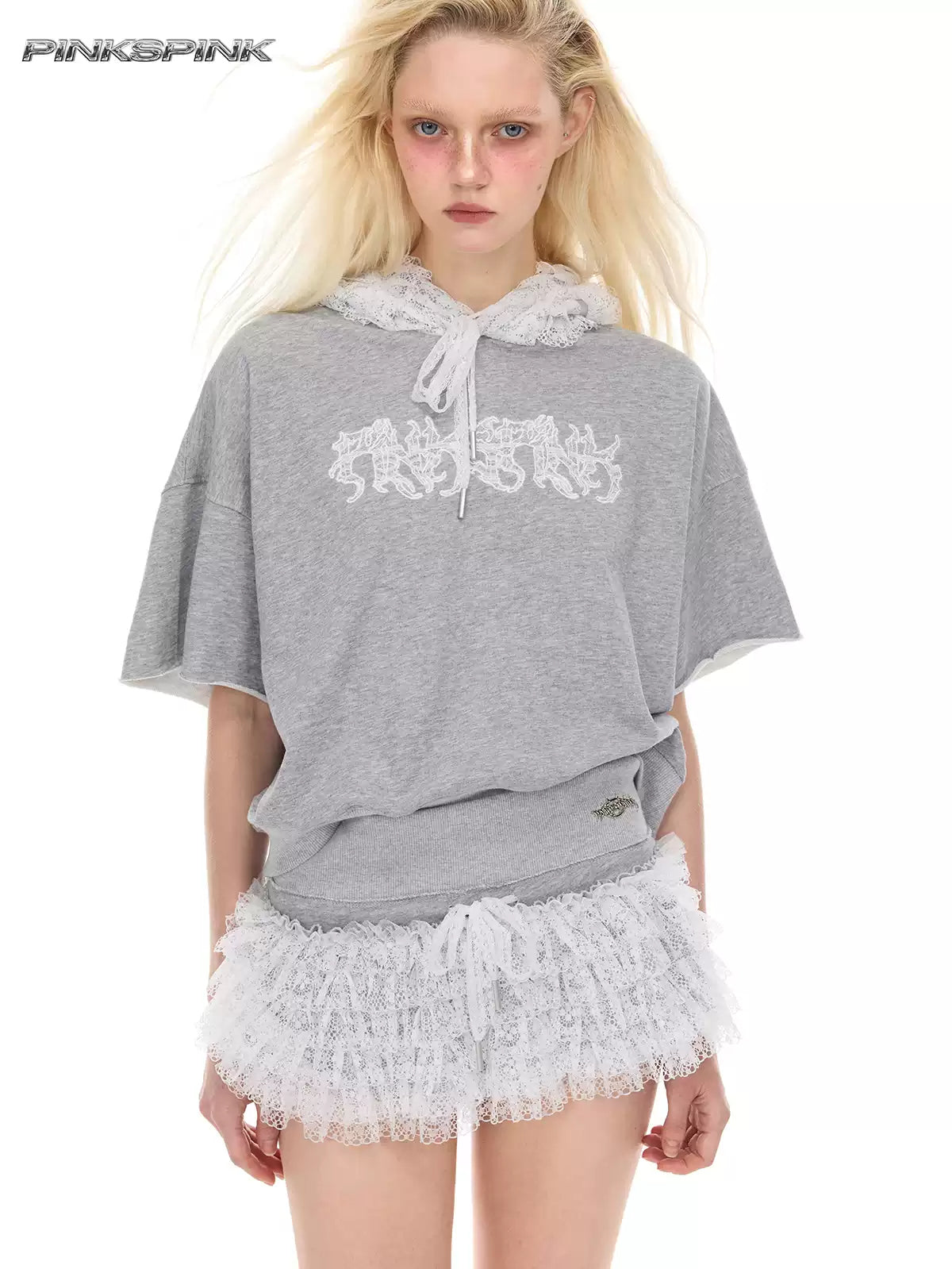 PINKSPINK MULTIVERSE lace micro shorts skirt — modeled front styling view