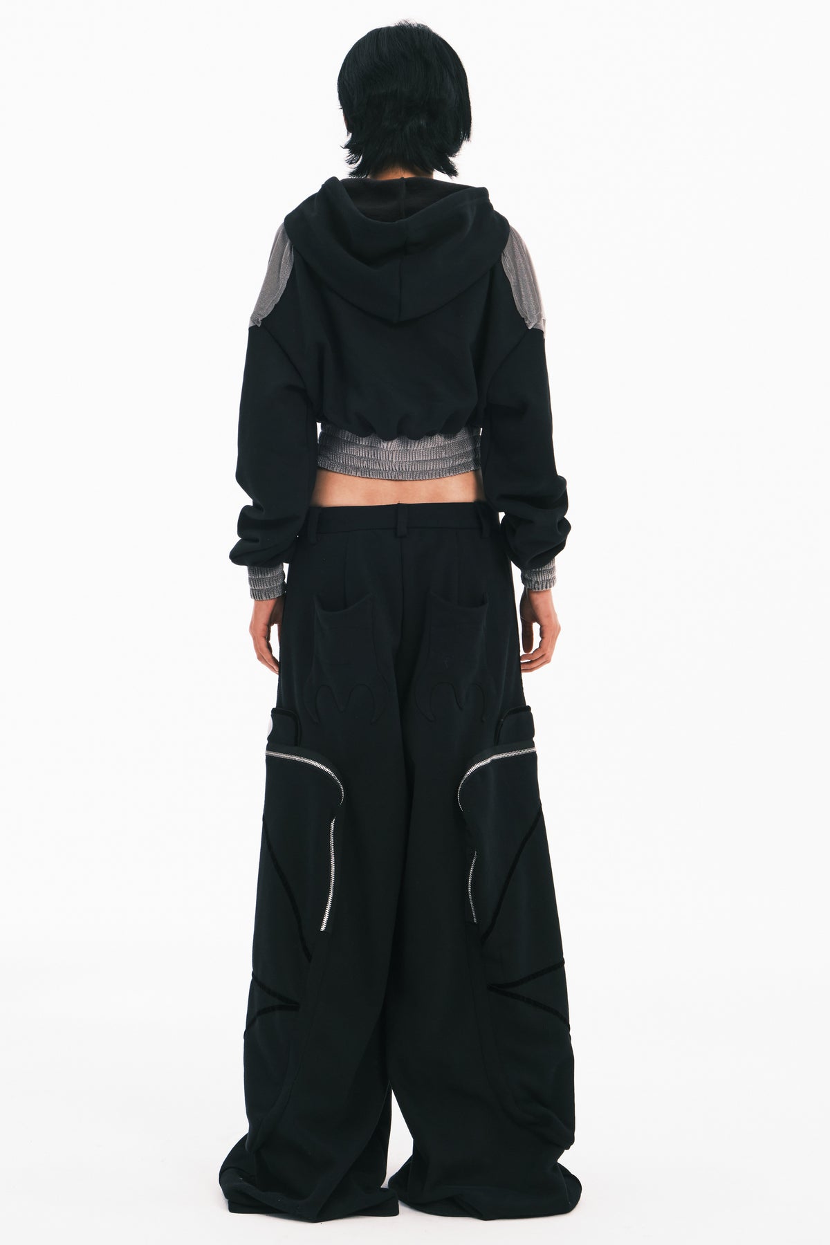 EMBRYO BIG POCKET wide-leg sweatpants in black — back modeled view showing the wide-leg silhouette