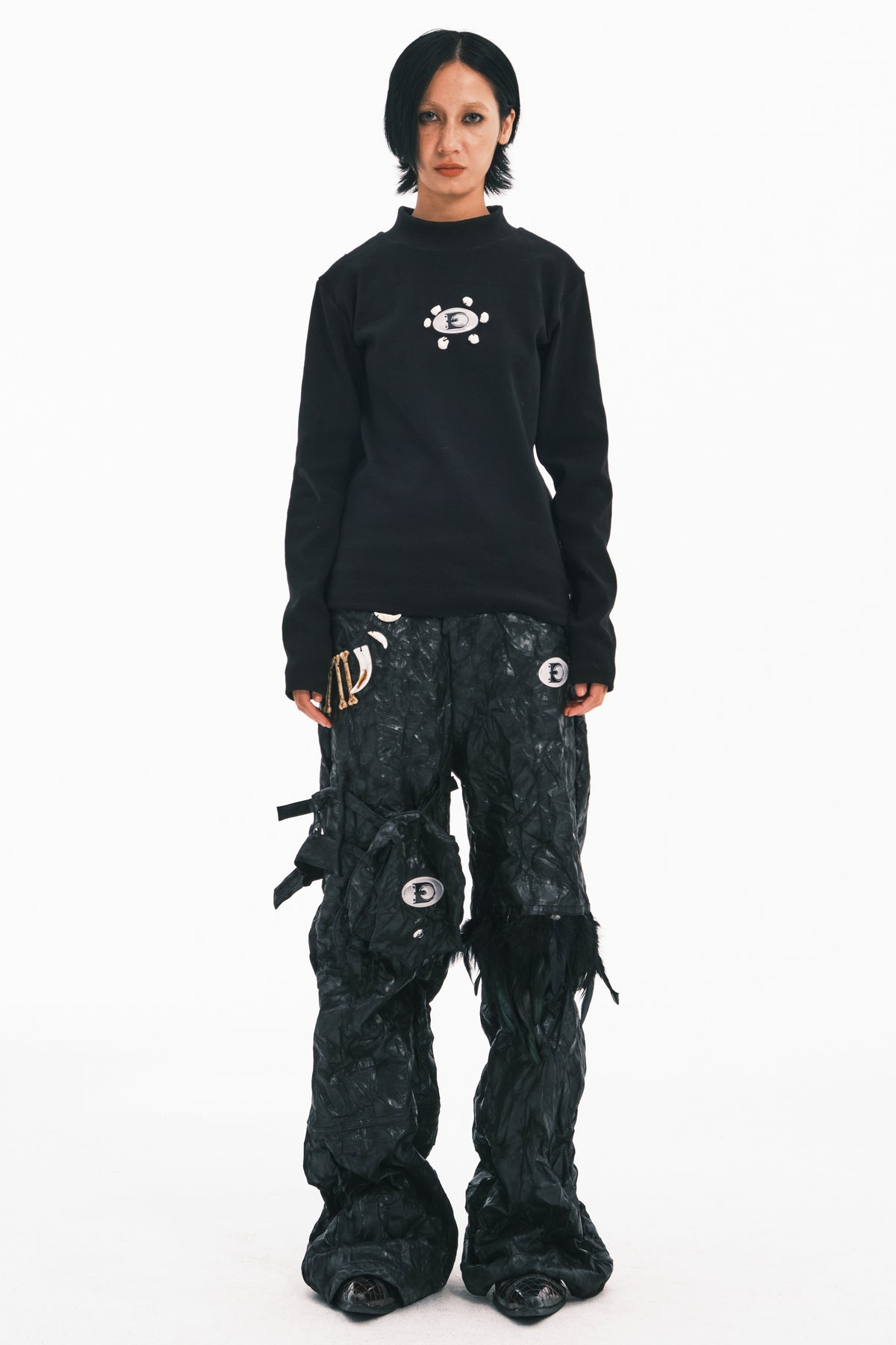 EMBRYO FEATHER LEG detachable-pouch flare pants — additional styled view