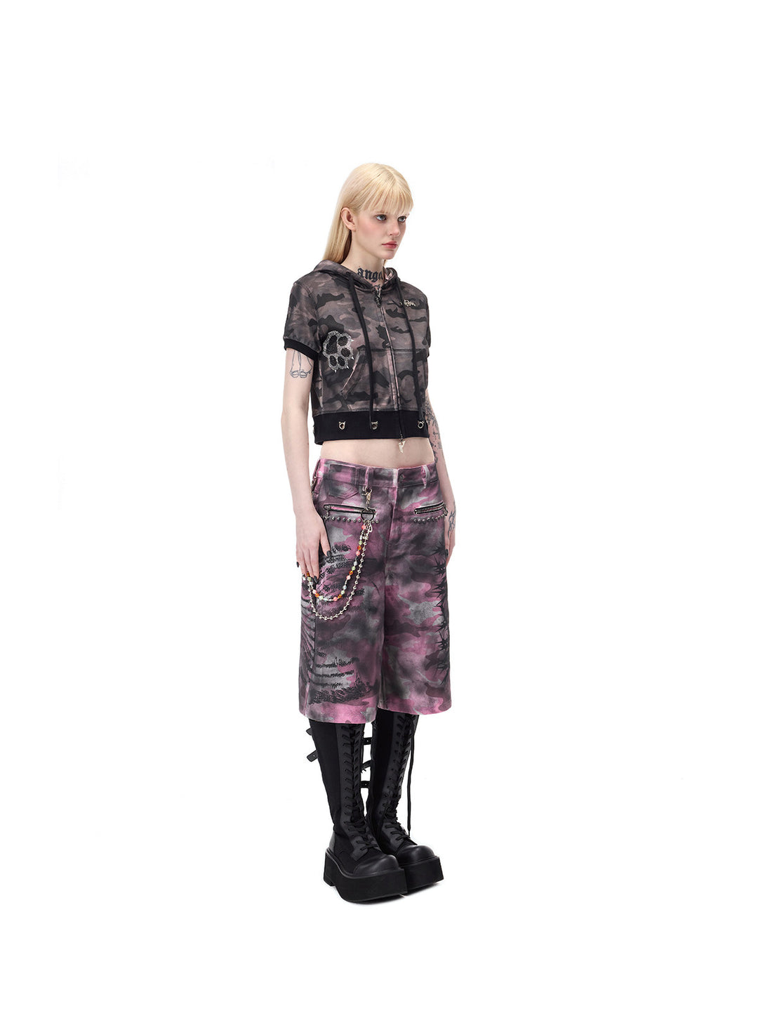 PINKSPINK ELECTRIC MOON coated camouflage denim shorts in pink-gray camouflage — full three-quarter view with chain styling