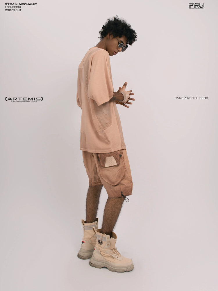 STARFIELD WELDER soft dawn orange distressed mesh tee — rear profile view with hands clasped
