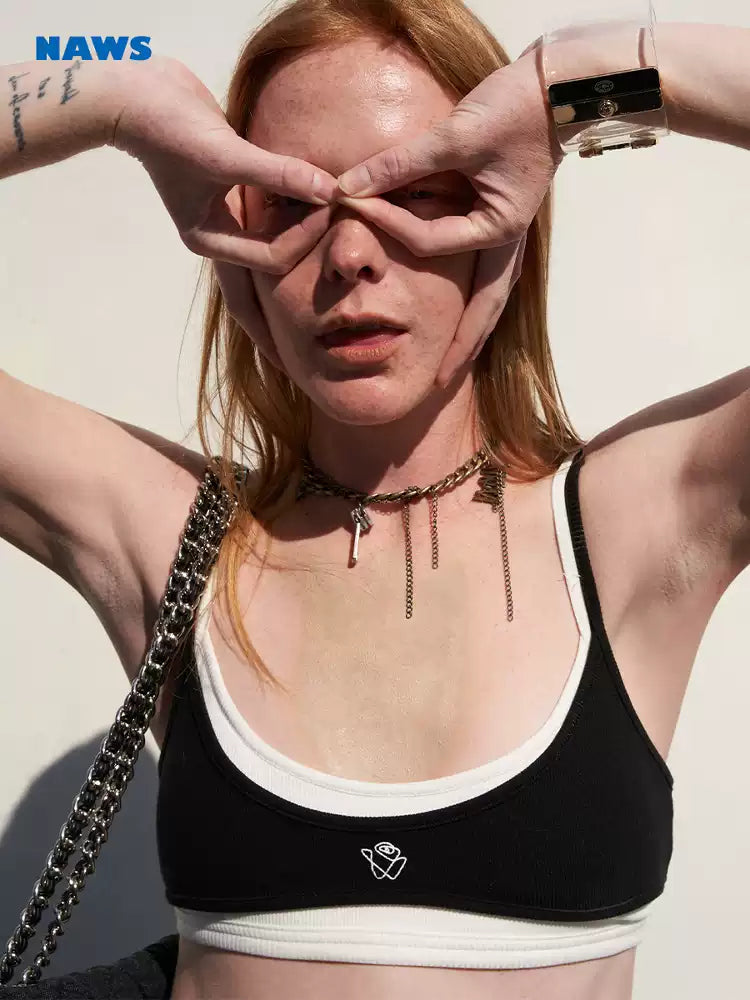 NAWS INTERPRETATION butterfly layering camisole — close modeled view highlighting the construction