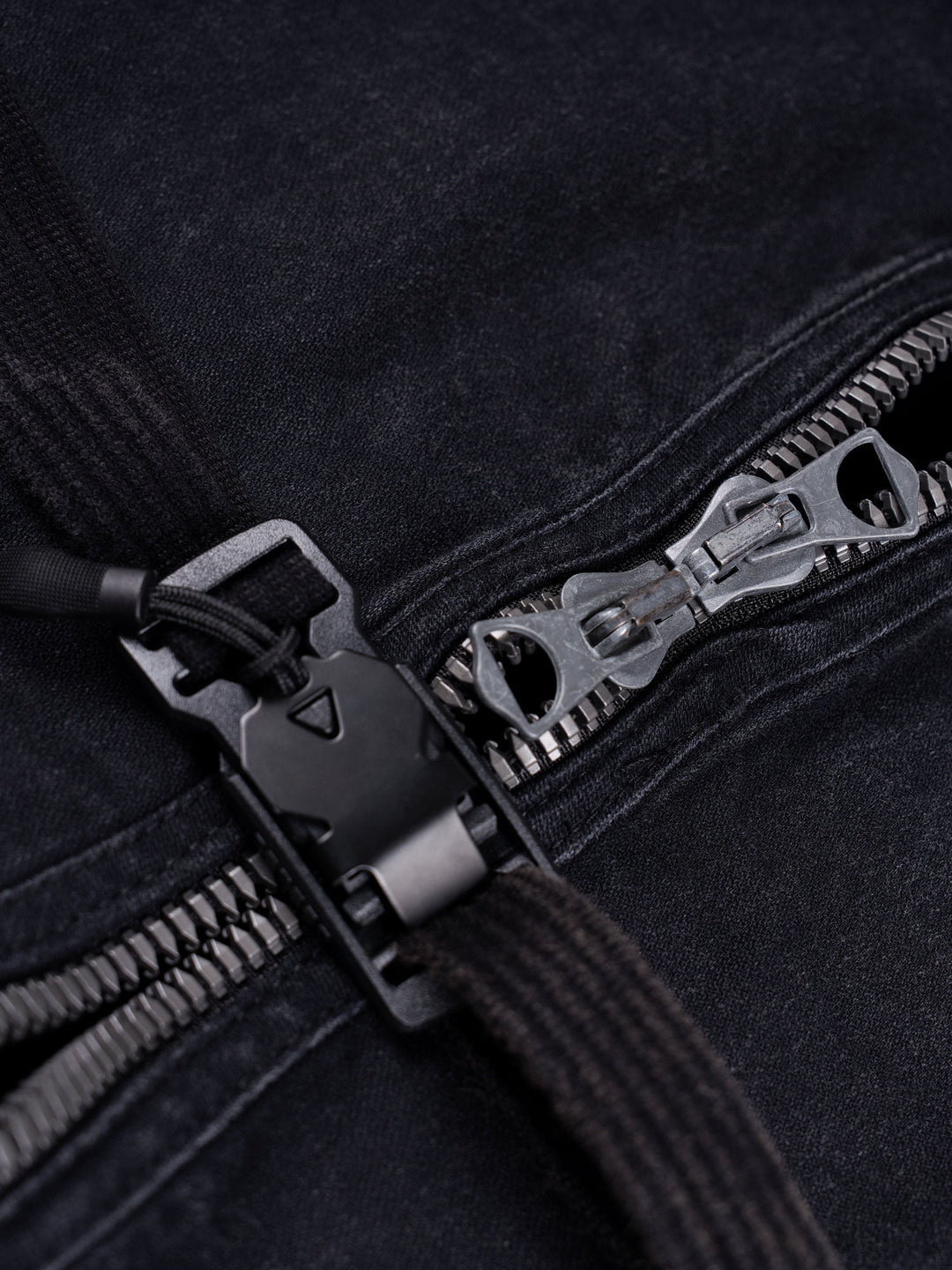GAIA night black priest zip robe jacket — two-way zipper sliders and waist buckle hardware close-up