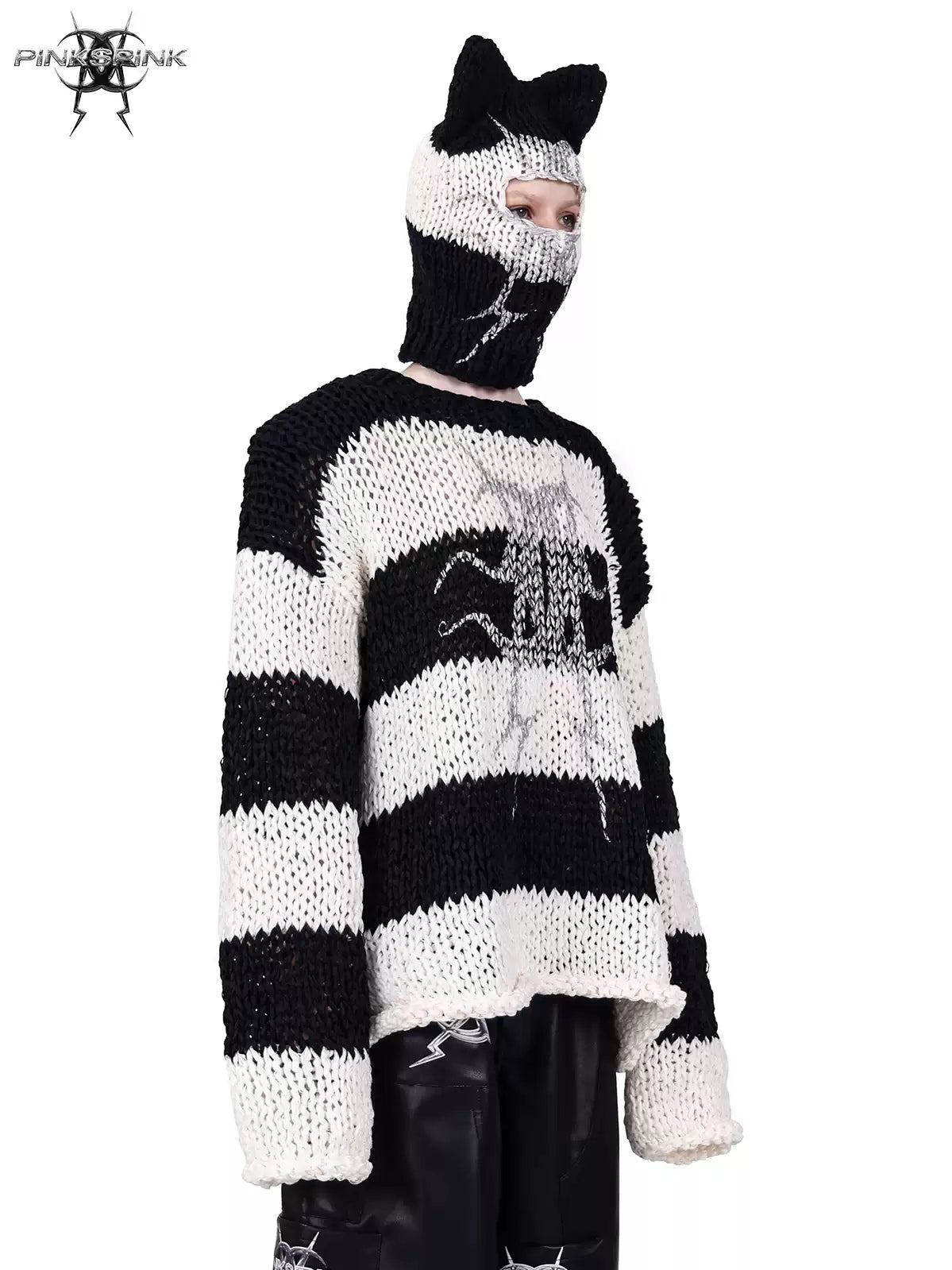 PINKSPINK MIRROR striped cat-ear knit balaclava in black white stripes — angled modeled close-up showing the eye opening