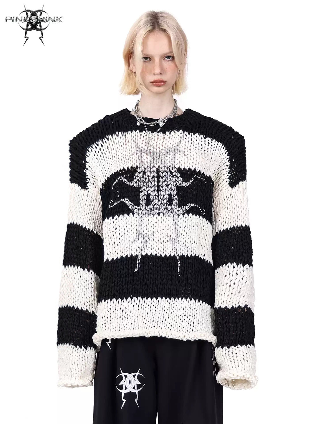 PINKSPINK MIRROR striped open-knit padded-shoulder sweater in black white stripes — front modeled close-up showing wide stripes and mirrored-moon artwork