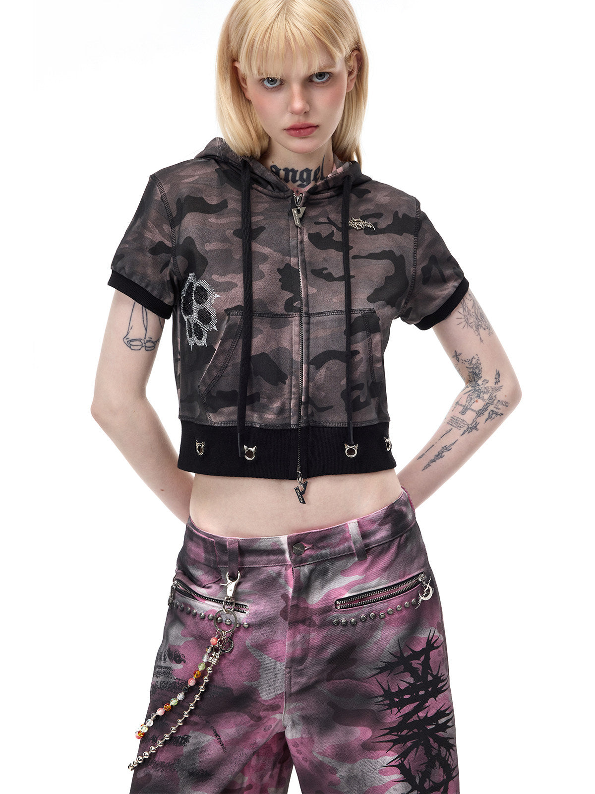 PINKSPINK CATPAW cropped cat-ear zip hoodie in gray-brown camouflage — three-quarter front modeled view with hands on hips