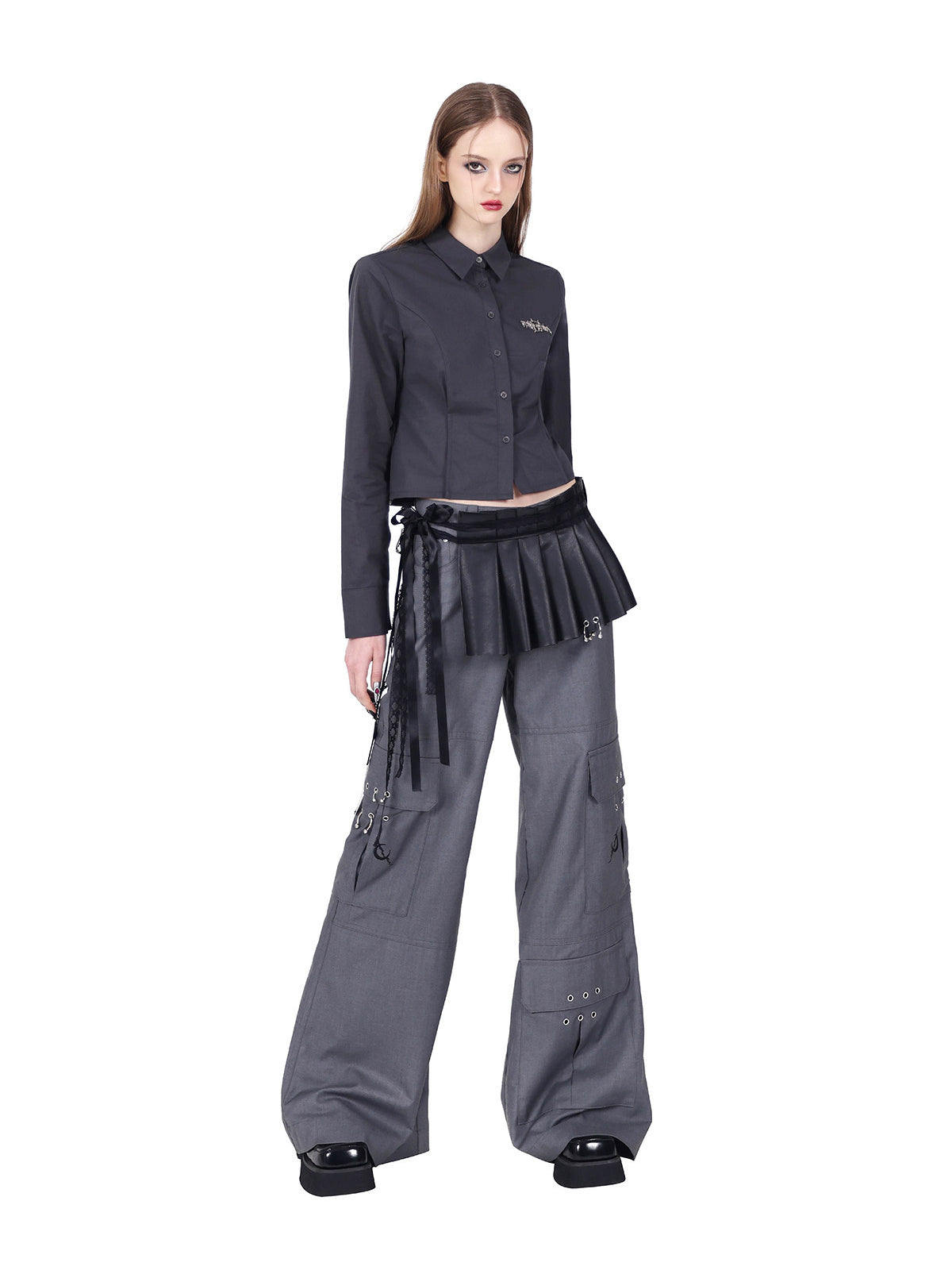 PINKSPINK ELECTRIC MOON sculpted cropped cotton shirt in gray — angled front modeled view with a separate pleated waist layer