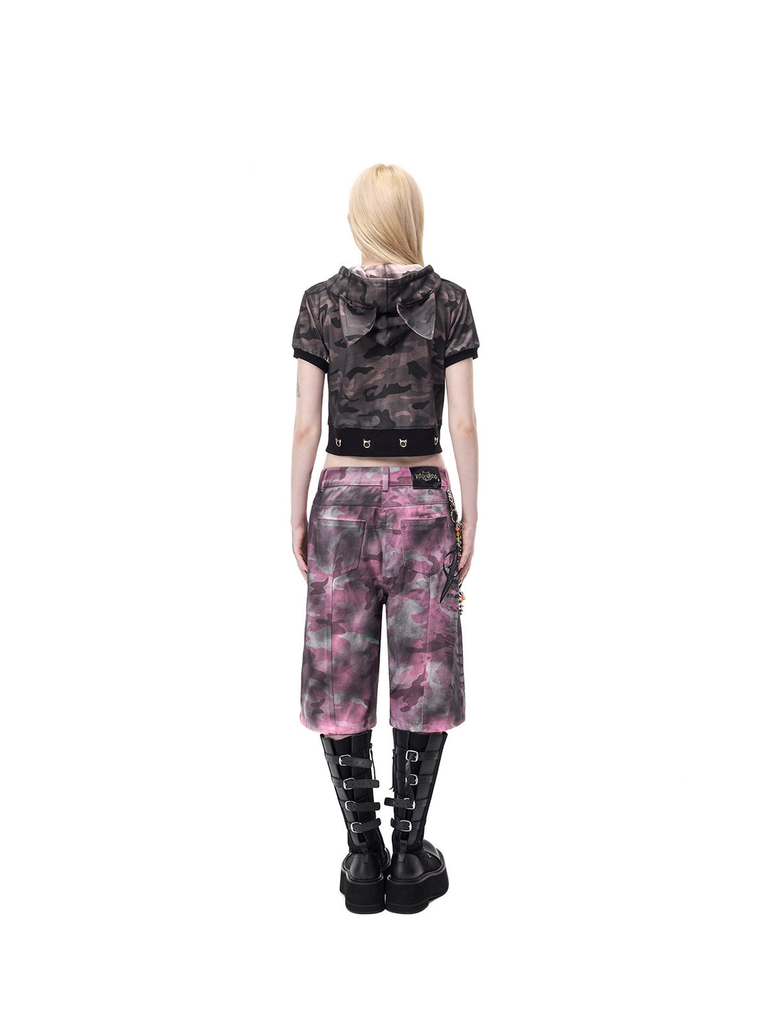 PINKSPINK ELECTRIC MOON coated camouflage denim shorts in pink-gray camouflage — full-length rear view of the wide-leg silhouette