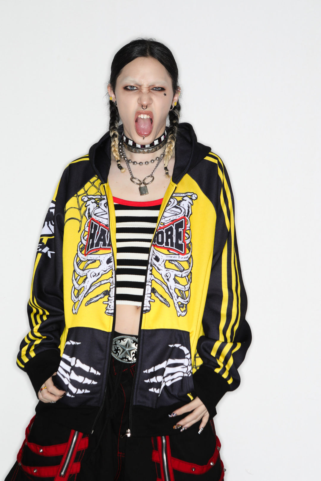 DeadEndKids Hardcore Generation skeleton zip-up hoodie — modeled front expression