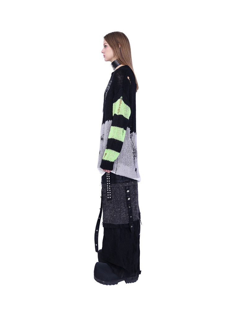 PINKSPINK SPHYNX distressed striped graphic sweater — black-green graphic sweater — side view showing striped sleeve